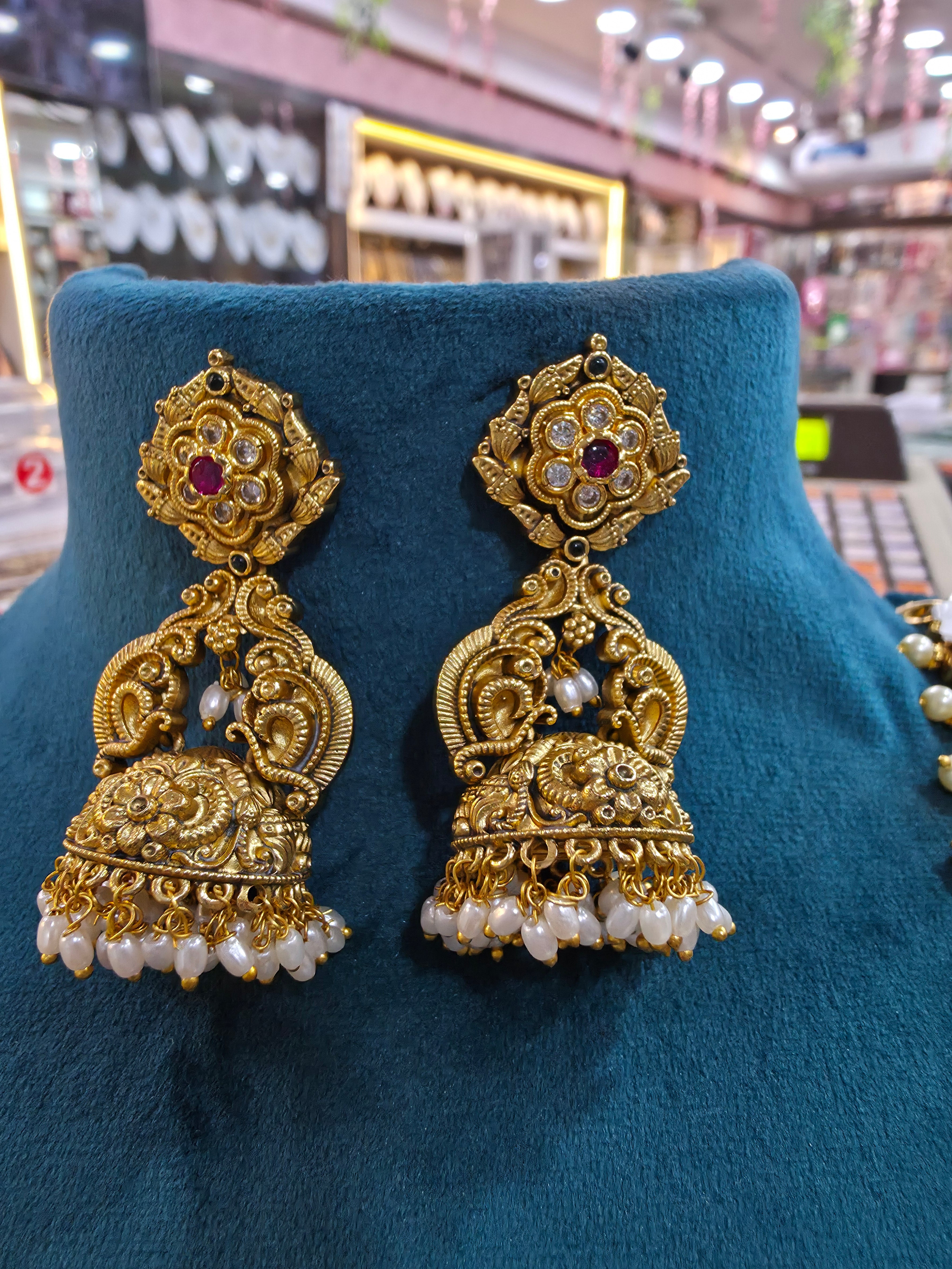 Antique jhumka with peacock design